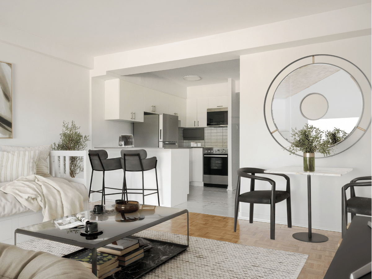 Virtually staged open-concept living room and kitchen at Le Hill-Park.